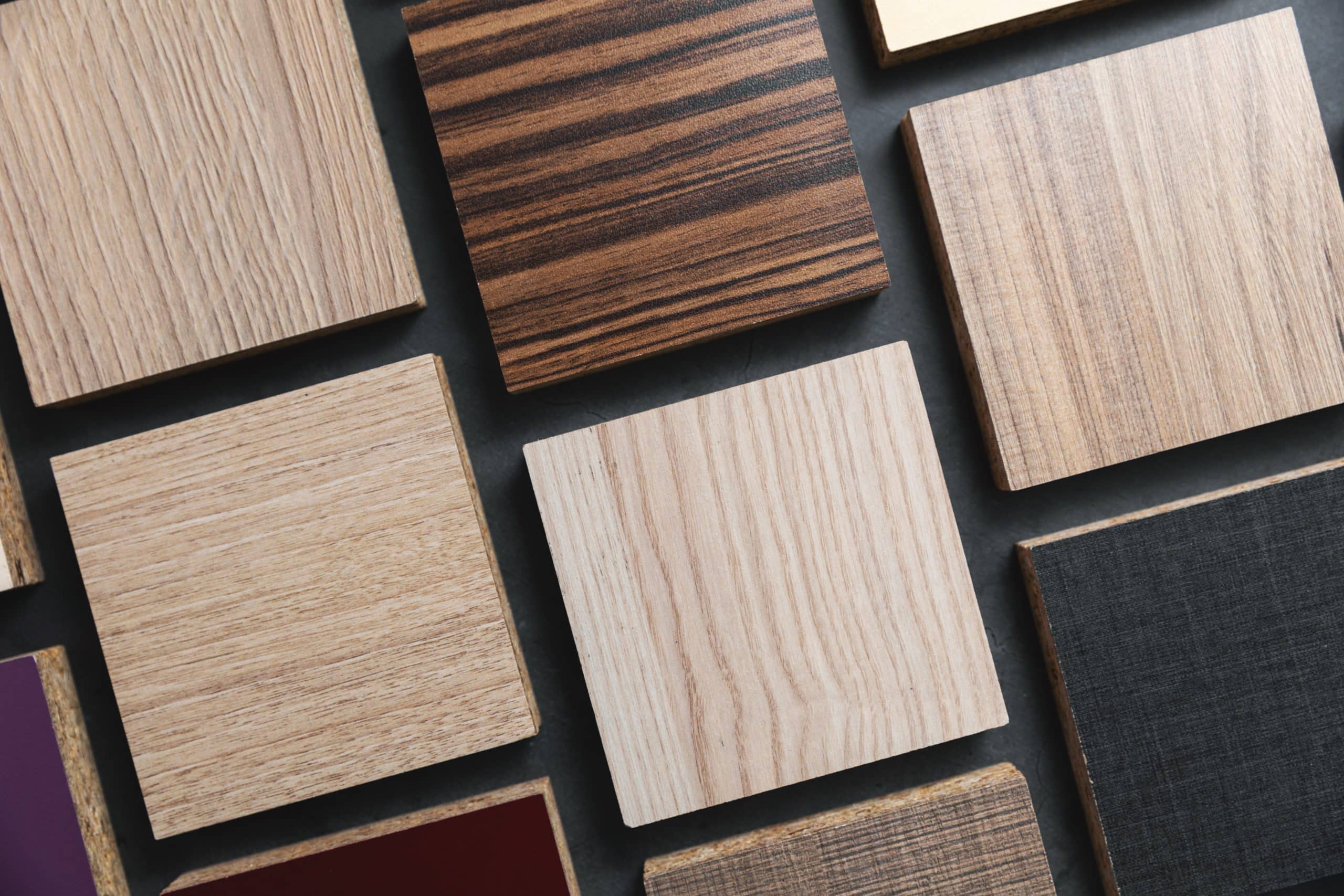 laminate material samples on dark black background